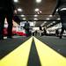 People walk along a pathway at the North American International Auto Show on Tuesday, Jan. 15. Daniel Brenner I AnnArbor.com
